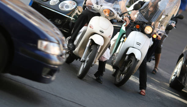 istock Roman traffic with scooters, Rome Italy 157289489