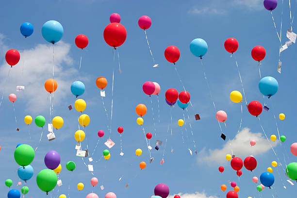 flying balloons  helium balloon stock pictures, royalty-free photos & images