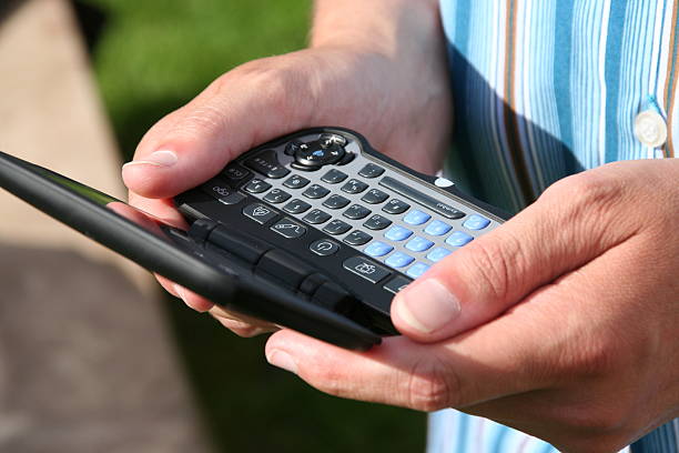 istock businessman holding pocket computer in his hands 157289653