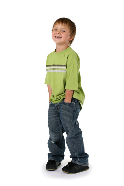 istock Young Boy Smiling With His Hands In Pockets 157289985