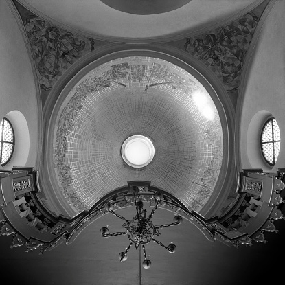 Ceiling with frescoes, St. Wojciech Church, Romanesque and Baroque style, Krakow, Poland, frog perspective, black and white image.
