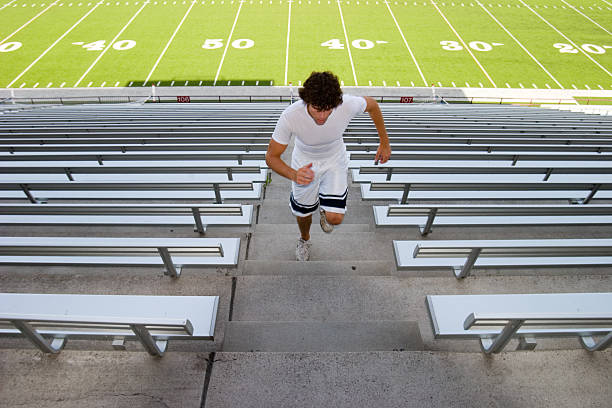 Grueling workout on stadium stairs stock photo
