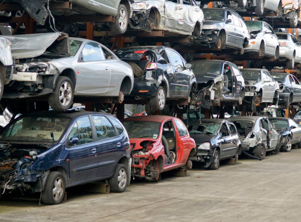 Scrap Vehicles Rows of scrap cars awaiting recycling scrap metal stock pictures, royalty-free photos & images