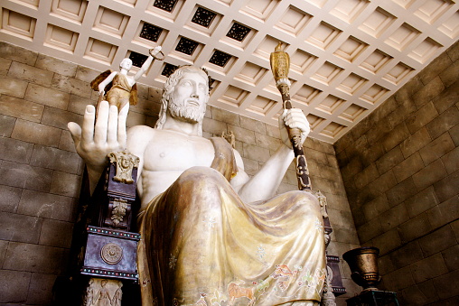 god zeus in a replica of greek temple.