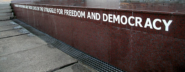 Freedom and Democracy from Memorial in Soweto, South Africa Detail from Hector Pieterson Memorial in Soweto, South Africa. Hector Pieterson was a young boy, who was shot on 16. June 1976 in Soweto during an uprise against apartheid and for Freedom and Democracy . All the words can be read in full size. civil rights stock pictures, royalty-free photos & images