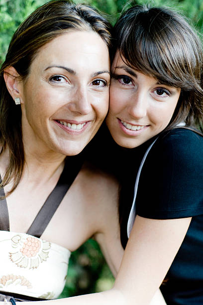istock mother and daughter smiling 157290532