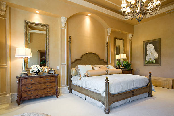 Bedroom Suite Beautiful master bedroom. (Image on wall is one of my limited editions.) owner's bedroom stock pictures, royalty-free photos & images