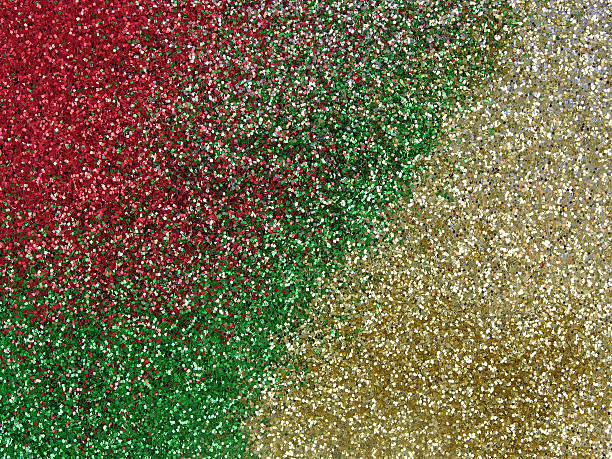 Red, green, and gold glitter stock photo