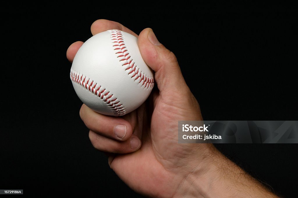 Nahaufnahme eines Mannes hand griping ein baseball-Spieler - Lizenzfrei Baseball-Spielball Stock-Foto