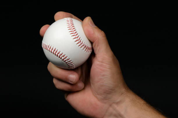 istock Close-up of man's hand griping a baseball 157291864