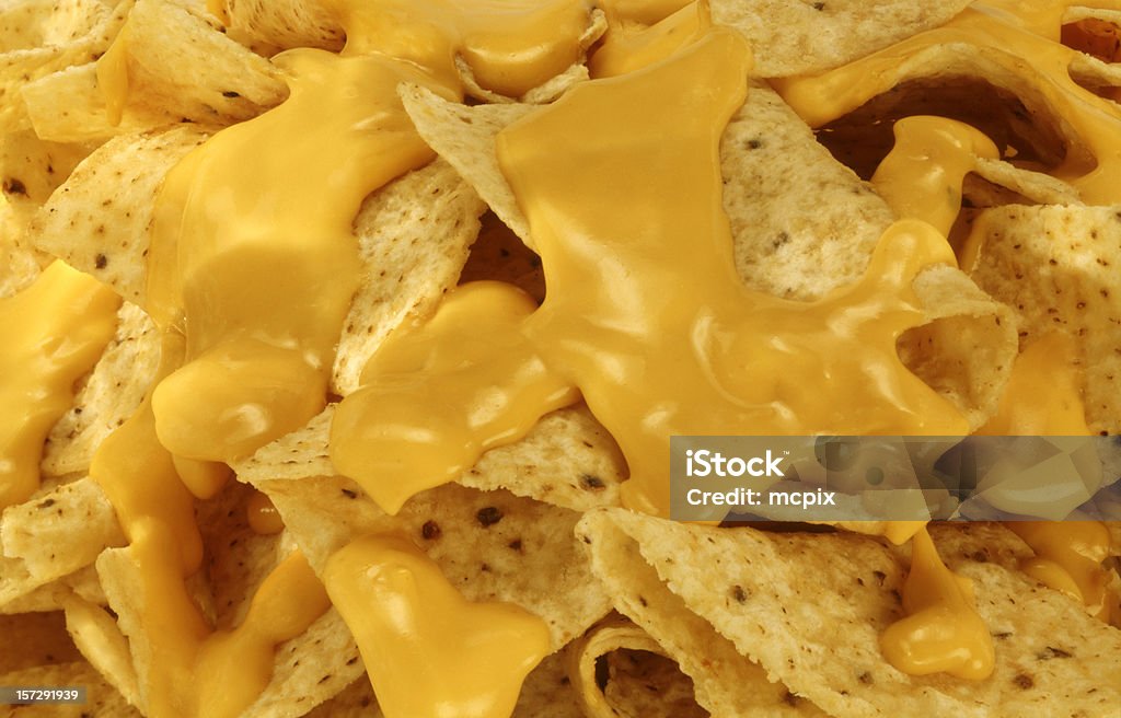 Nachos and Melted Cheese. Restaurant style nachos and melted cheese. Nacho Chip Stock Photo