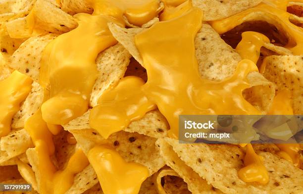 Nachos And Melted Cheese Stock Photo - Download Image Now - Nacho Chip, Cheese, Melting