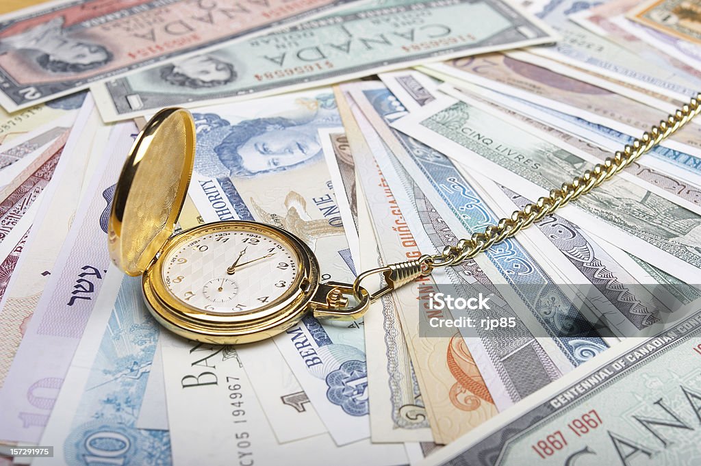 Valuta internazionale e ora - Foto stock royalty-free di Banconota