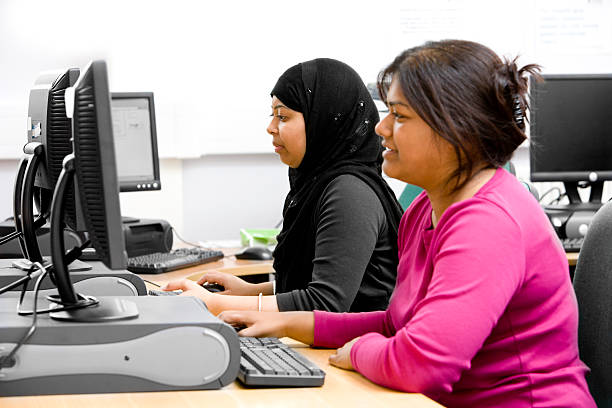 istock adult education: South Asian women studying online 157292594