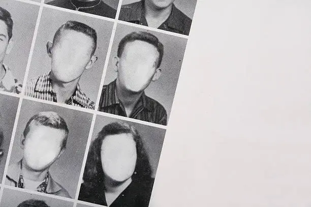 Faceless yearbook photos.