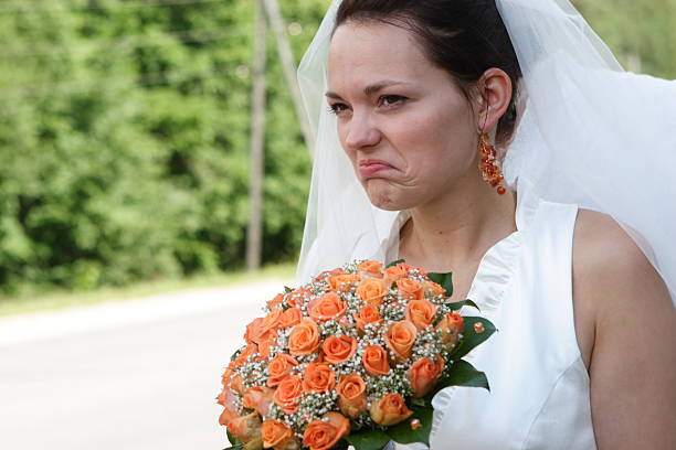 Unhappy bride Funny expression of unhappy bride bride stock pictures, royalty-free photos & images