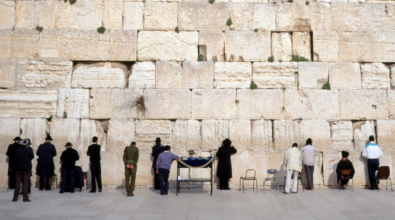 Notes and prayer slips are put into the Western Wall in Jerusalem, Israel by visitors from all over the world.