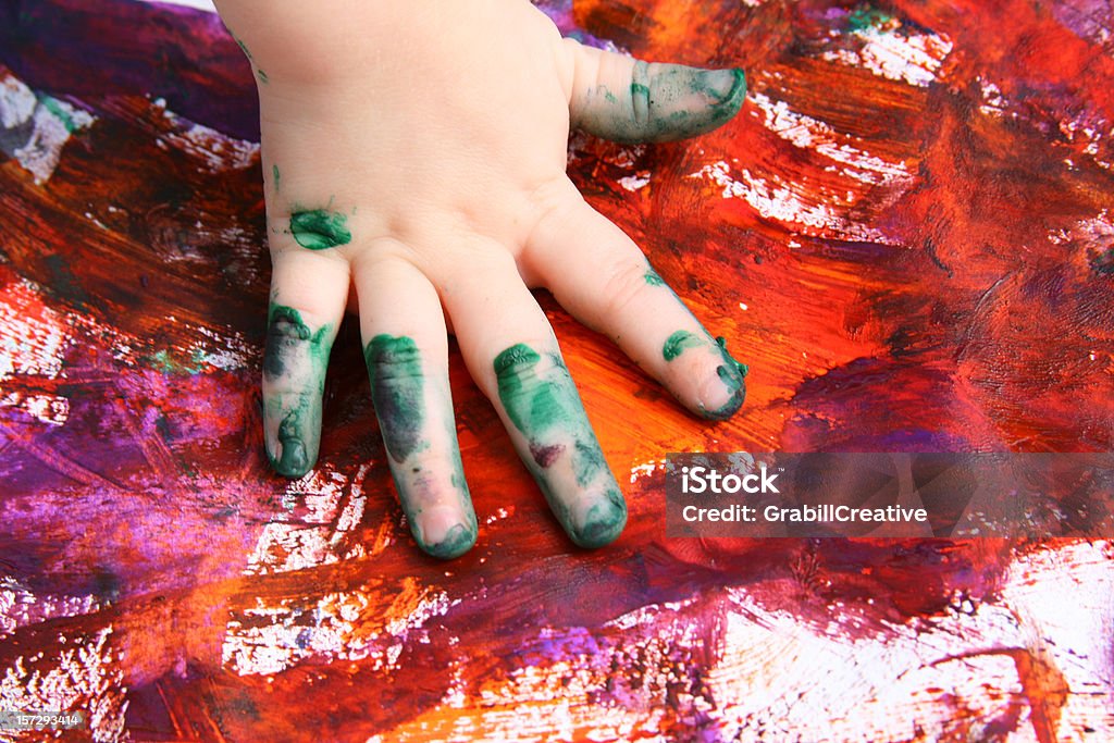 Handprint Art: Preschooler Finger painting  Painting - Activity Stock Photo