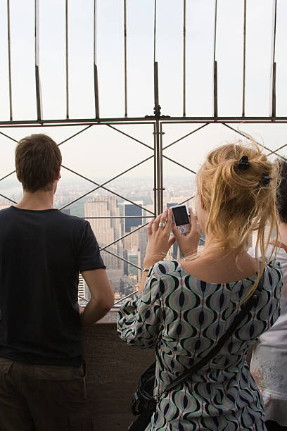 istock Tourists on the Empire State Building 157293527