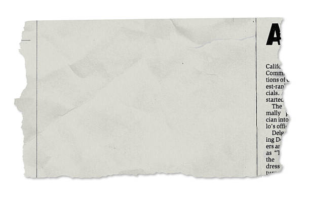 un periódico desgarros en blanco - ripped paper fotografías e imágenes de stock
