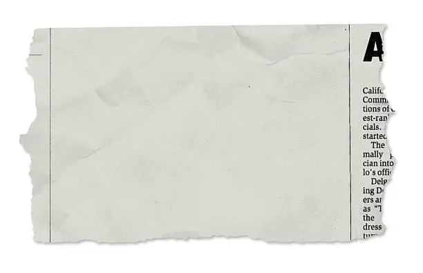 Photo of Single newspaper tear - on white