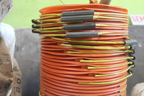 istock pile of orange plastic buckets 1572942259