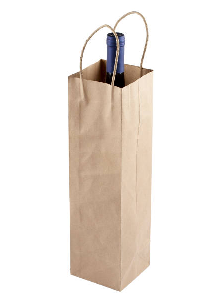 istock Wine bottle in gift bag, isolated on white background 157294343