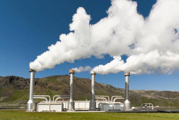 4 steel chimneys with smoke from geothermal energy A geothermic power station.  iceland image horizontal color image stock pictures, royalty-free photos & images