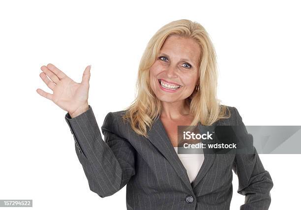 Photo libre de droit de Sourire Et De La Vague banque d'images et plus d'images libres de droit de Cheveux blonds - Cheveux blonds, Costume habillé, Gris