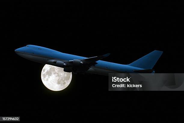 Airplane At Midnight In Front Of Full Moon Stock Photo - Download Image Now - Airplane, Night, Commercial Airplane