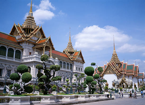 This ancient Thai temple shines brilliantly with its grandeur. Glazed tiles sparkle, and the golden Buddha statues exude solemnity. The air is filled with the scent of incense, creating an atmosphere of reverence and sanctity in the temple. Captured with the Leica Q3.