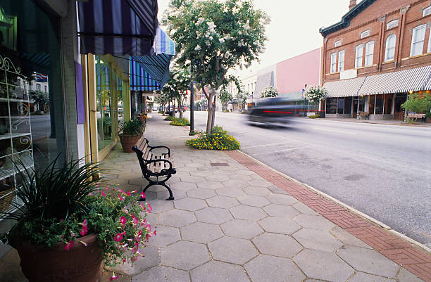 Clean road with bench in Americus, Georgia stock photo