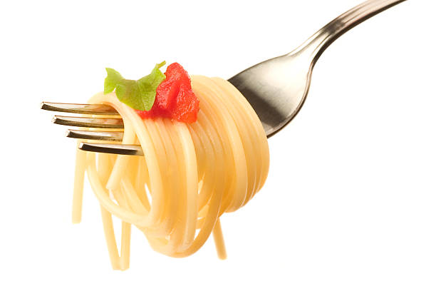 istock Fork with a bite sized swirl of spaghetti and tomato 157295438