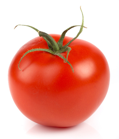 Fresh tomato, isolated on white background. Studio shot.