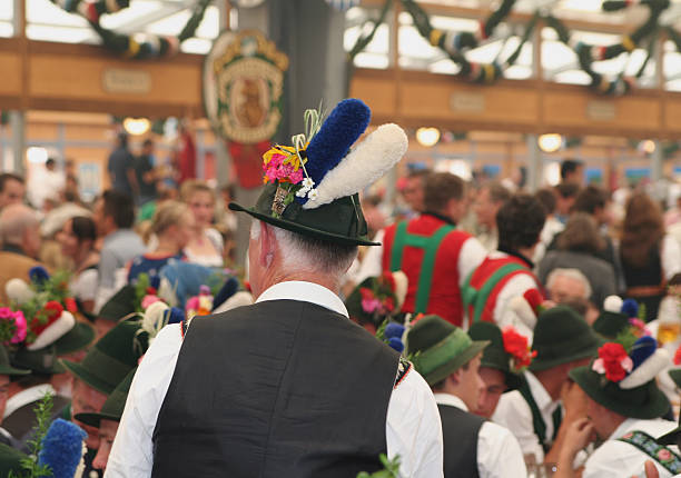 Celebration at the Beer Fest inside a bavarian tent stock photo