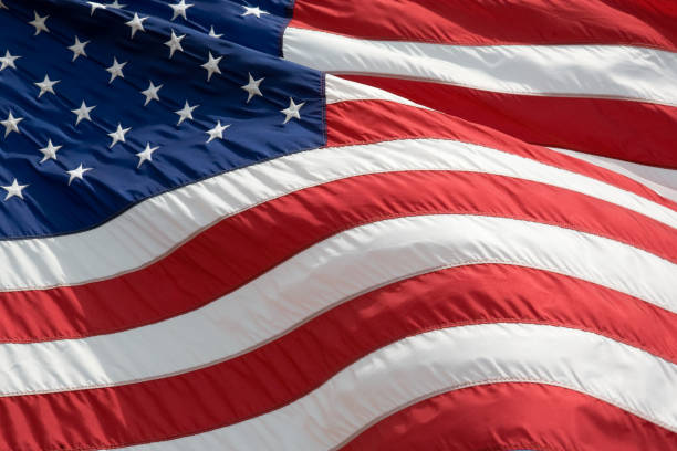 istock American Flag Waving in the Wind 157295727