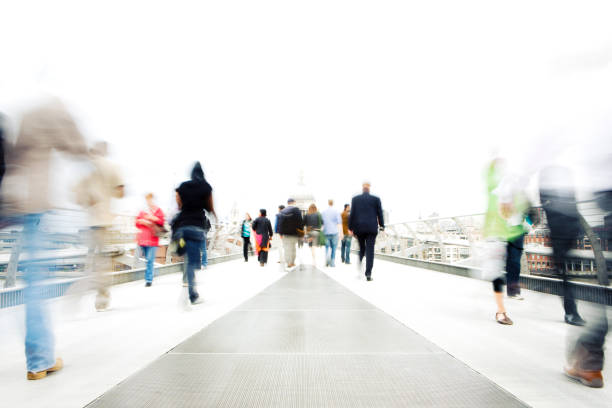 istock High key, long exposure bleached commuters in an urban setting 157295787