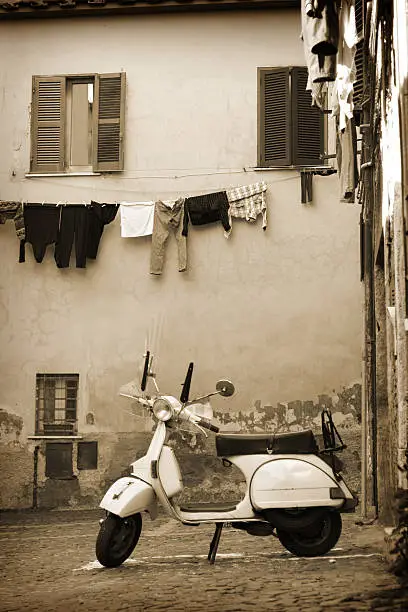 Photo of Italian vintage scooter in a village, Lazio Italy