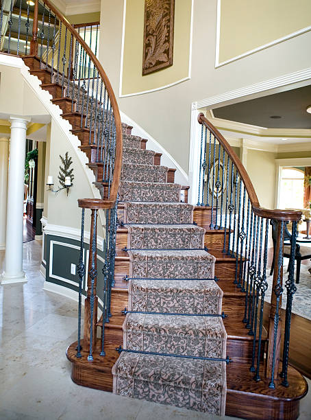 istock Curved Staircase in Modern Luxury Home Suburbia 157296060
