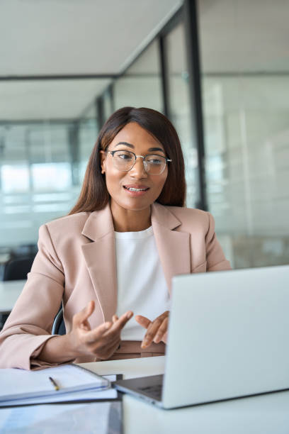 istock Professional business woman manager working in office having virtual interview. 1572980504