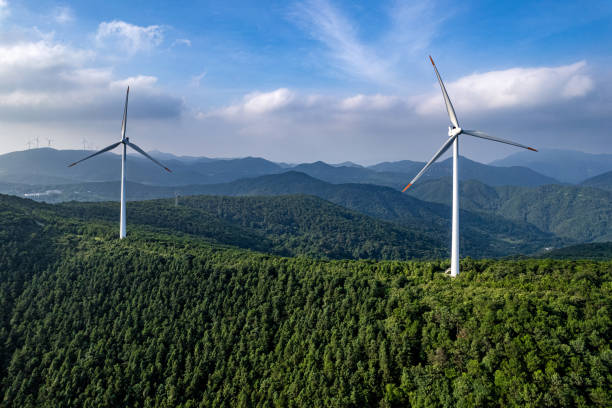 istock Wind turbines in the forest on the mountain 1573025845