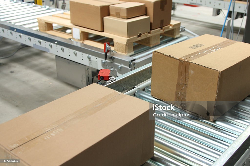 boxes on conveyor belt Box - Container Stock Photo