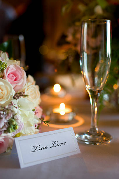 istock Bridal Bouquet and Wedding Reception Place Setting with Champagne Flute 157305452