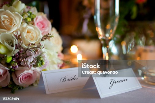 istock Bride and Groom Place Cards with Bouquet at Wedding Reception 157305454