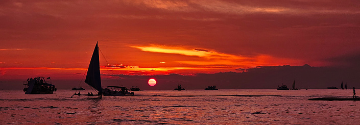 Beautiful and enchanting sunset at WhiteBeach, Boracay, Philippines