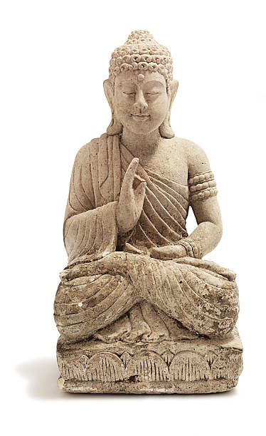 A stone Buddha ornament on a white background