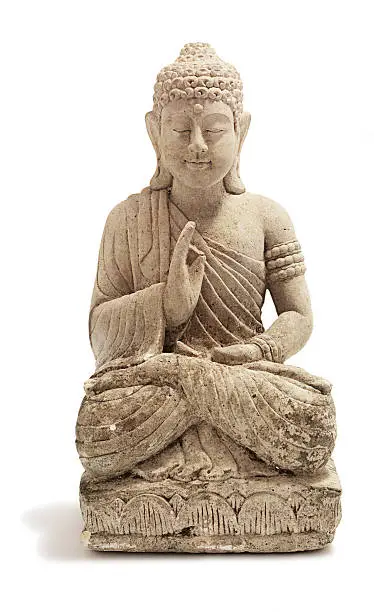 Photo of A stone Buddha ornament on a white background