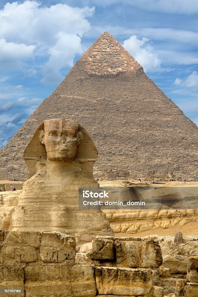 Great Sphinx of Giza against the Great Pyramid, Giza, Egypt Egypt Stock Photo