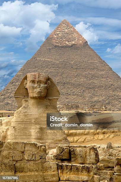 Great Sphinx Of Giza Against The Great Pyramid Giza Egypt Stock Photo - Download Image Now
