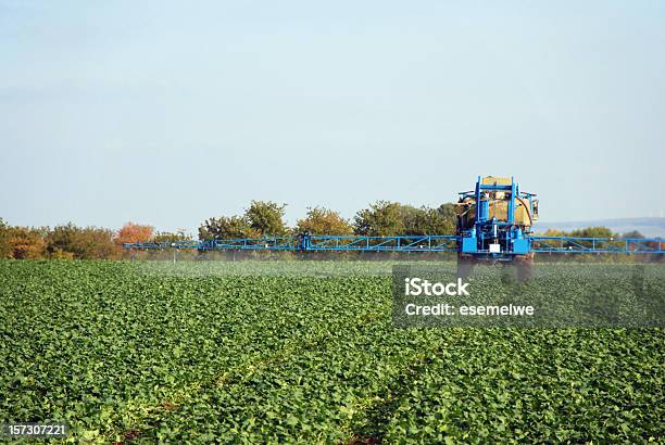 A Farm Sprayer Distributes Liquid Chemicals To The Crops Stock Photo - Download Image Now